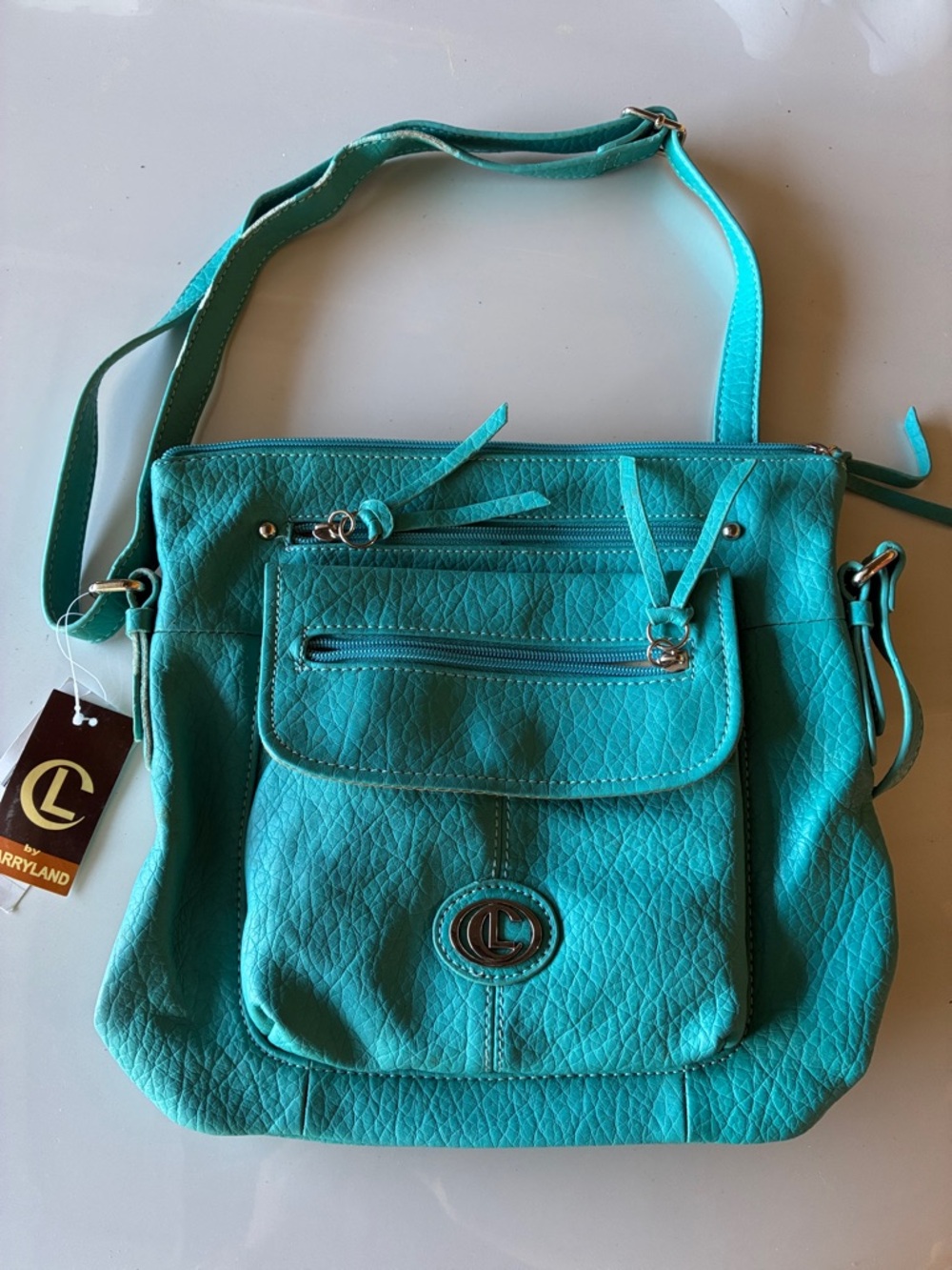 Teal Quilted Crossbody Bag Leather-Like material with Front Pocket. Beige Int.